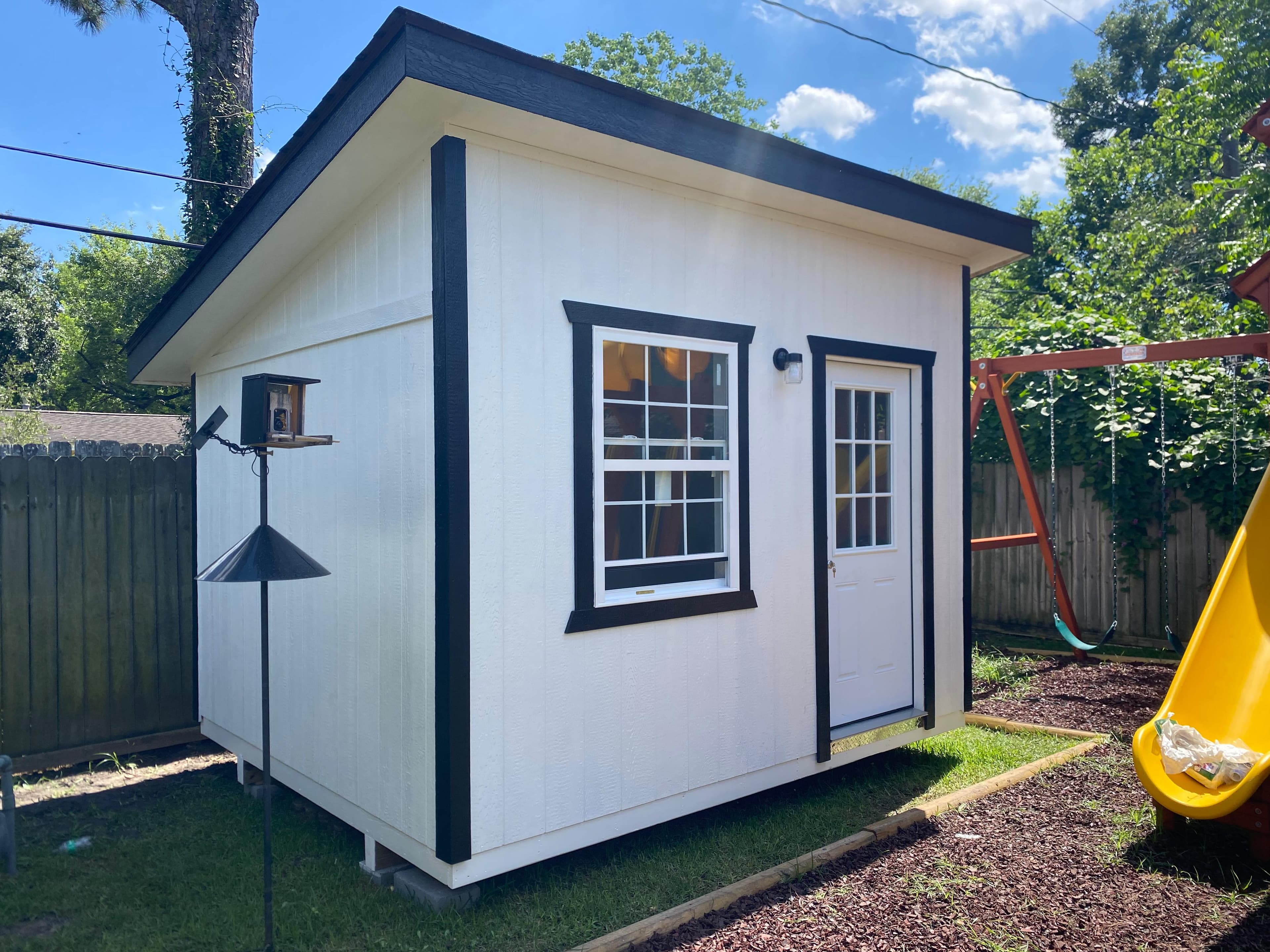 White and black Alamo Platinum backyard shed exterior available from Johnny's Backyard.